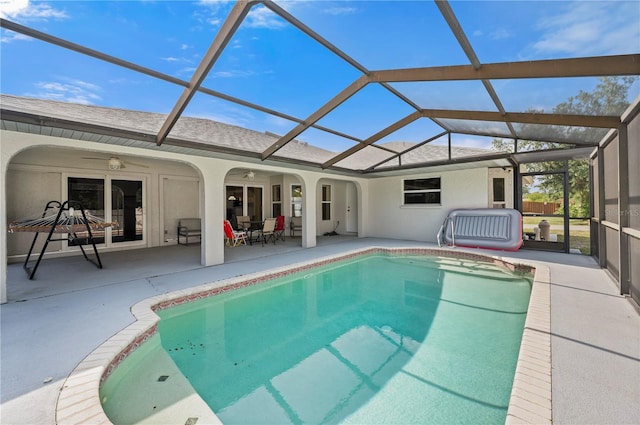 891 Bayard St, Port Charlotte, FL 33948 - swimming pool featuring a ceiling fan, a patio, and glass enclosure