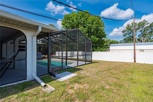 891 Bayard St, Port Charlotte, FL 33948 - view of yard featuring glass enclosure and a patio area