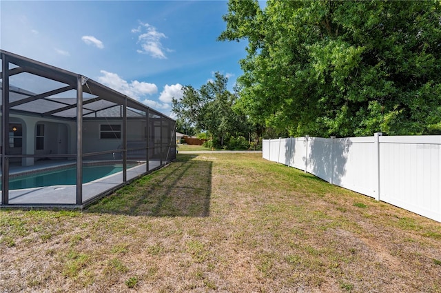 891 Bayard St, Port Charlotte, FL 33948 - view of yard with glass enclosure and an outdoor pool