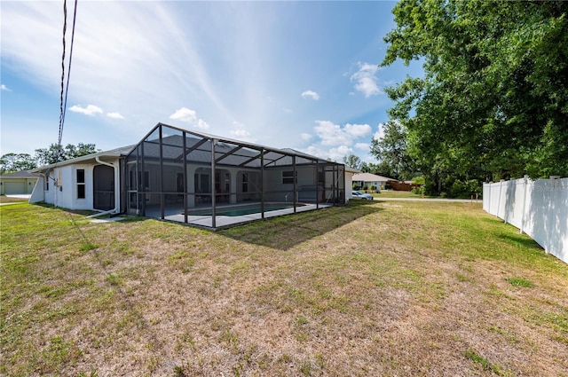 891 Bayard St, Port Charlotte, FL 33948 - view of yard featuring glass enclosure and an outdoor pool