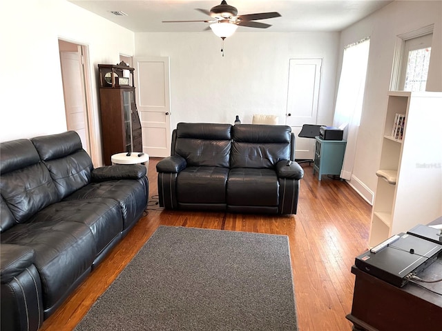 404 W Whidden St, Arcadia, FL 34266 - living area with a ceiling fan and wood finished floors