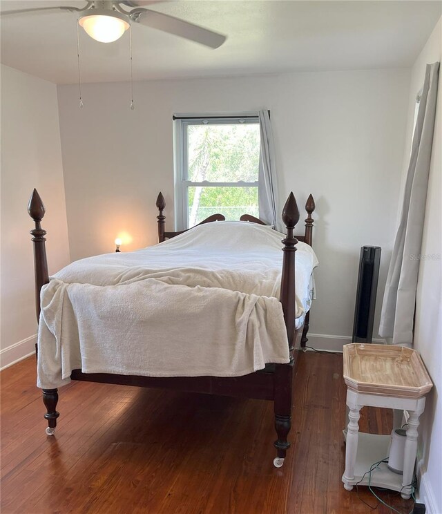 404 W Whidden St, Arcadia, FL 34266 - bedroom featuring hardwood / wood-style floors, a ceiling fan, and baseboards