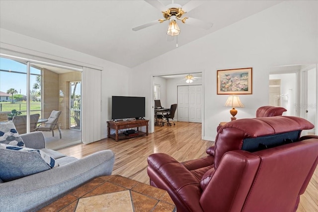 7334 N Tulip Tree, Punta Gorda, FL 33955 - living room featuring ceiling fan, wood finished floors, high vaulted ceiling, and baseboards