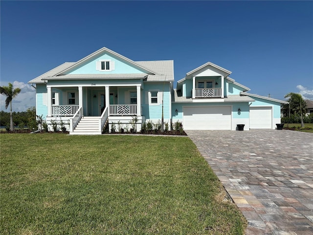 3548 Mondovi Ct, Punta Gorda, FL 33950 - view of front facade with a porch, decorative driveway, and a front yard