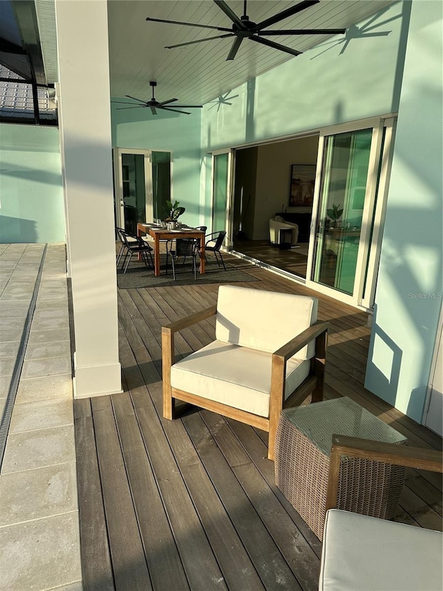 3548 Mondovi Ct, Punta Gorda, FL 33950 - wooden deck with outdoor dining area and ceiling fan