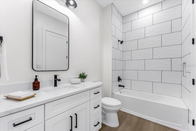 3548 Mondovi Ct, Punta Gorda, FL 33950 - bathroom featuring vanity, wood finished floors, and tub / shower combination