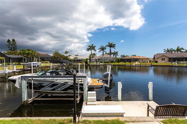 523 Saint Girons Ct, Punta Gorda, FL 33950 - dock featuring a residential view, a water view, and boat lift