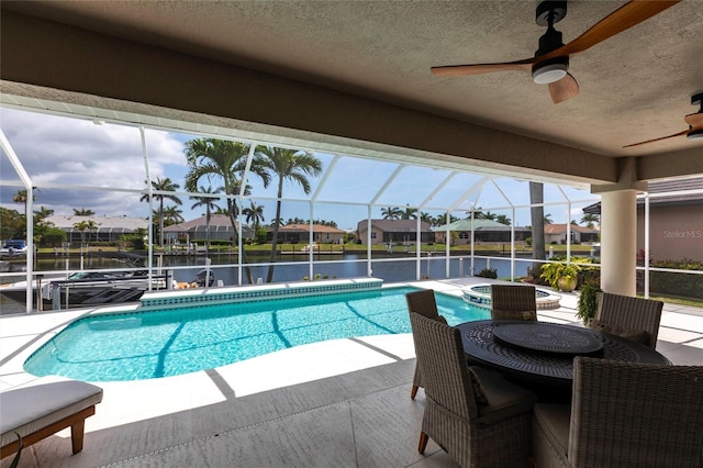 523 Saint Girons Ct, Punta Gorda, FL 33950 - view of pool featuring ceiling fan, a patio area, glass enclosure, and a residential view