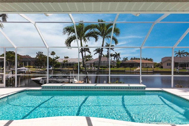 523 Saint Girons Ct, Punta Gorda, FL 33950 - swimming pool with a lanai, a water view, a residential view, and a patio