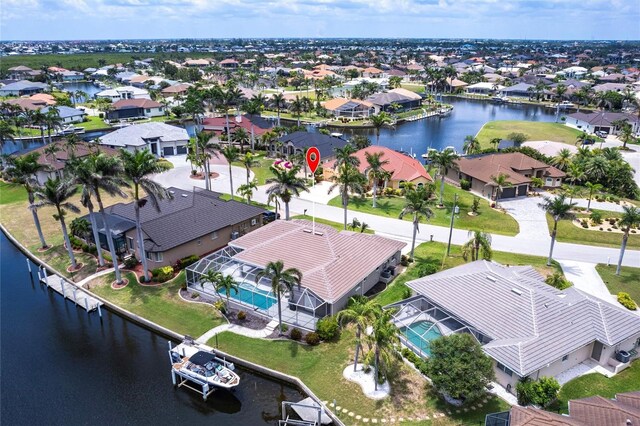 523 Saint Girons Ct, Punta Gorda, FL 33950 - aerial perspective of suburban area featuring a large body of water