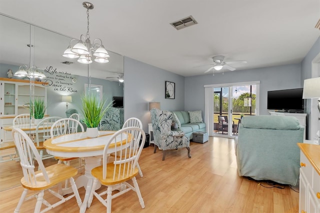 25275 Rampart Blvd Unit 1504, Punta Gorda, FL 33983 - dining area with a ceiling fan and light wood-style flooring