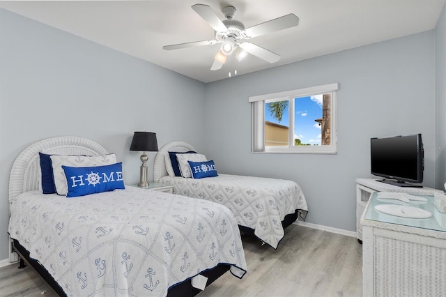 25275 Rampart Blvd Unit 1504, Punta Gorda, FL 33983 - bedroom with wood finished floors, baseboards, and ceiling fan