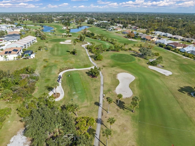 25275 Rampart Blvd Unit 1504, Punta Gorda, FL 33983 - aerial view of property's location with a large body of water, nearby suburban area, a local golf course, and a tree filled landscape
