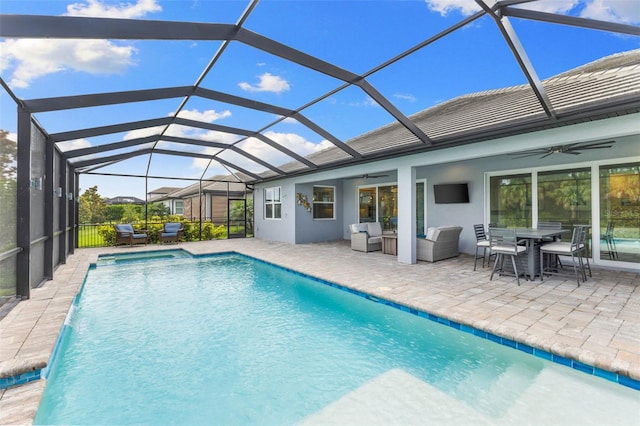 19821 Montenero Way, Venice, FL 34293 - outdoor pool with ceiling fan, a patio, an outdoor hangout area, and outdoor dining space