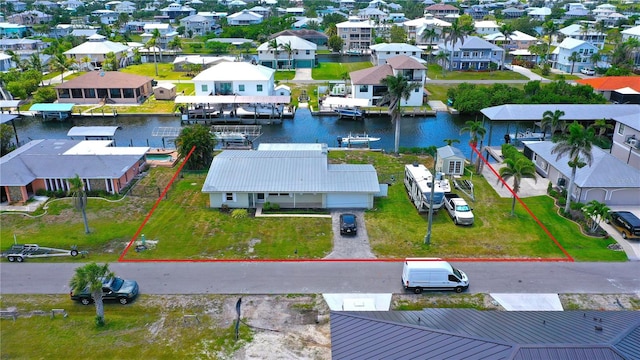 24239 Yacht Club Blvd, Punta Gorda, FL 33955 - aerial view of residential area with a large body of water