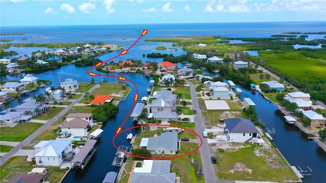 24239 Yacht Club Blvd, Punta Gorda, FL 33955 - aerial view of residential area with a nearby body of water