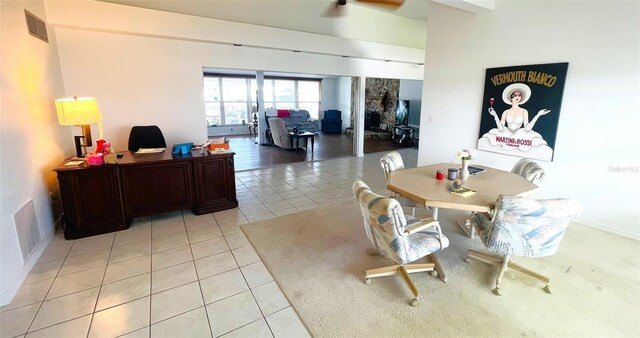 24239 Yacht Club Blvd, Punta Gorda, FL 33955 - dining area with light tile patterned flooring and ceiling fan