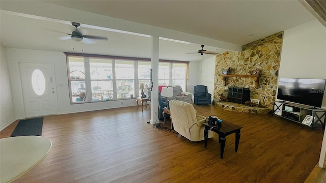 24239 Yacht Club Blvd, Punta Gorda, FL 33955 - living room with a ceiling fan, wood finished floors, and a fireplace