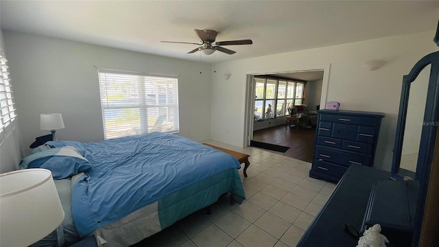 24239 Yacht Club Blvd, Punta Gorda, FL 33955 - bedroom featuring light tile patterned floors and ceiling fan
