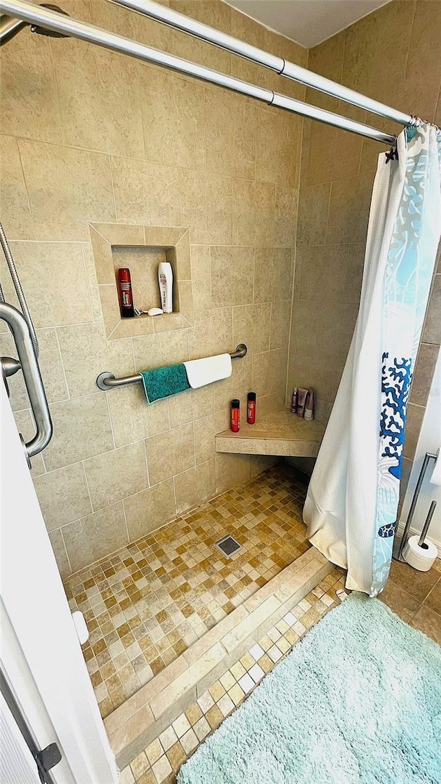24239 Yacht Club Blvd, Punta Gorda, FL 33955 - bathroom with a stall shower and tile patterned floors