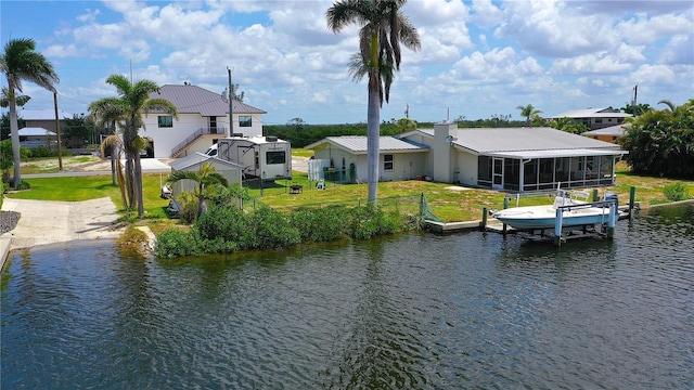 24239 Yacht Club Blvd, Punta Gorda, FL 33955 - dock featuring a water view and boat lift