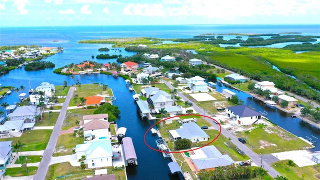 24239 Yacht Club Blvd, Punta Gorda, FL 33955 - aerial view of residential area with a large body of water