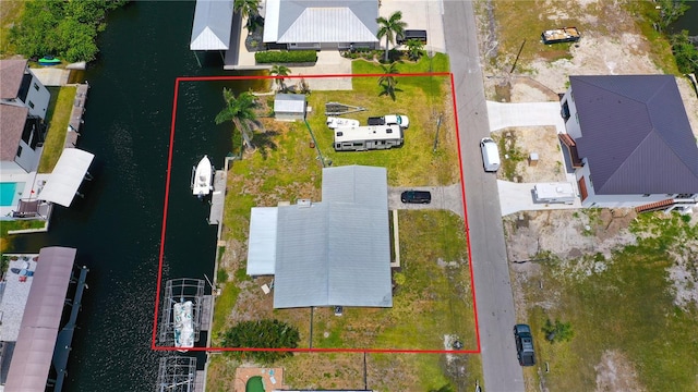 24239 Yacht Club Blvd, Punta Gorda, FL 33955 - aerial view of property's location featuring a nearby body of water and property boundaries highlighted