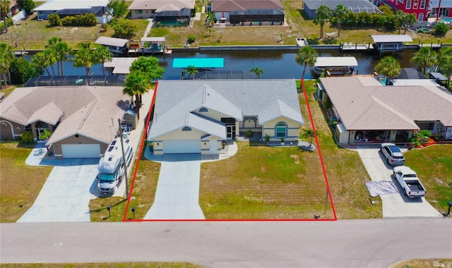 2399 Bendway Dr, Port Charlotte, FL 33948 - aerial perspective of suburban area with property parcel outlined and a nearby body of water