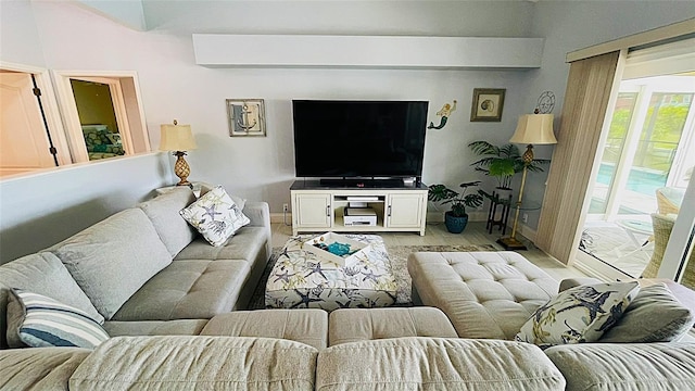 2399 Bendway Dr, Port Charlotte, FL 33948 - living room featuring baseboards and light wood-style flooring