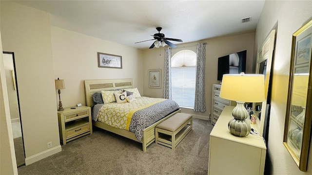 2399 Bendway Dr, Port Charlotte, FL 33948 - carpeted bedroom with baseboards and ceiling fan