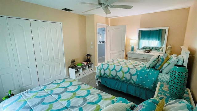 2399 Bendway Dr, Port Charlotte, FL 33948 - bedroom with a closet, a ceiling fan, and carpet flooring