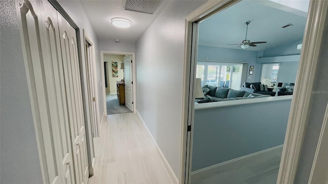 2399 Bendway Dr, Port Charlotte, FL 33948 - corridor with baseboards