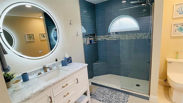 2399 Bendway Dr, Port Charlotte, FL 33948 - bathroom with toilet, vanity, a tile shower, a textured wall, and tile patterned floors