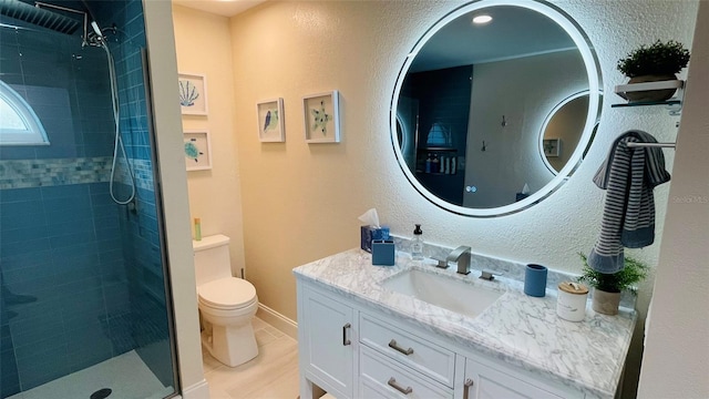 2399 Bendway Dr, Port Charlotte, FL 33948 - bathroom with vanity, a tile shower, toilet, wood finished floors, and a textured wall