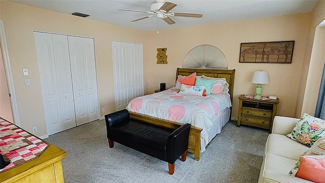 2399 Bendway Dr, Port Charlotte, FL 33948 - carpeted bedroom featuring two closets and ceiling fan