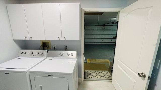 2399 Bendway Dr, Port Charlotte, FL 33948 - washroom with washer and clothes dryer and cabinet space