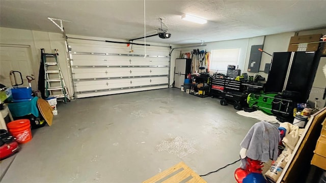 2399 Bendway Dr, Port Charlotte, FL 33948 - garage featuring electric panel and a garage door opener