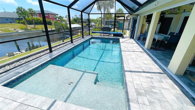 2399 Bendway Dr, Port Charlotte, FL 33948 - swimming pool featuring a patio, a water view, a hot tub, a lanai, and a residential view