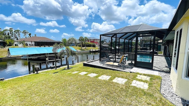 2399 Bendway Dr, Port Charlotte, FL 33948 - dock featuring a water view, a yard, boat lift, glass enclosure, and a pool