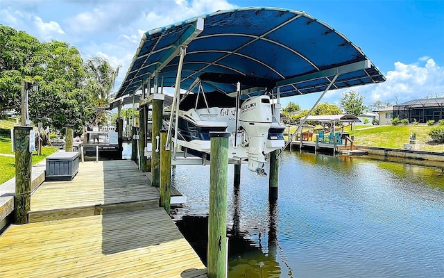 2399 Bendway Dr, Port Charlotte, FL 33948 - dock featuring boat lift and a water view