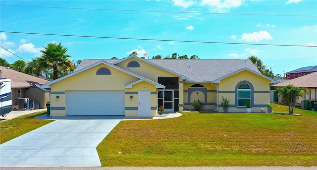 2399 Bendway Dr, Port Charlotte, FL 33948 - view of front of property featuring stucco siding, driveway, an attached garage, a front yard, and central AC
