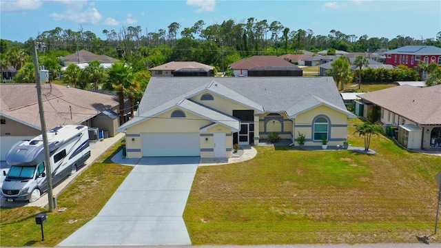 2399 Bendway Dr, Port Charlotte, FL 33948 - view of front of property with driveway, a residential view, and stucco siding