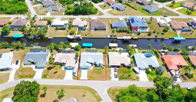 2399 Bendway Dr, Port Charlotte, FL 33948 - aerial view of residential area with a large body of water and property parcel outlined