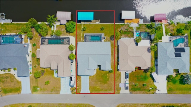 2399 Bendway Dr, Port Charlotte, FL 33948 - aerial perspective of suburban area with property boundaries highlighted and a pool area