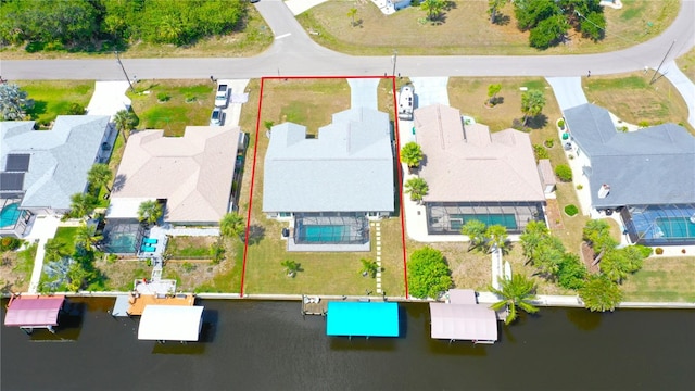 2399 Bendway Dr, Port Charlotte, FL 33948 - aerial perspective of suburban area with property boundaries highlighted and a large body of water