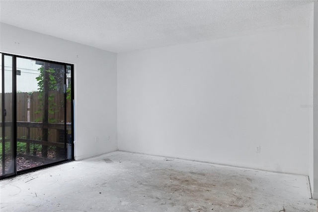 1515 Paul Russell Rd # 64, Tallahassee, FL 32301 - empty room with a textured ceiling