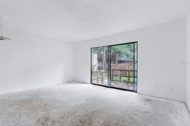1515 Paul Russell Rd # 64, Tallahassee, FL 32301 - empty room featuring a textured ceiling