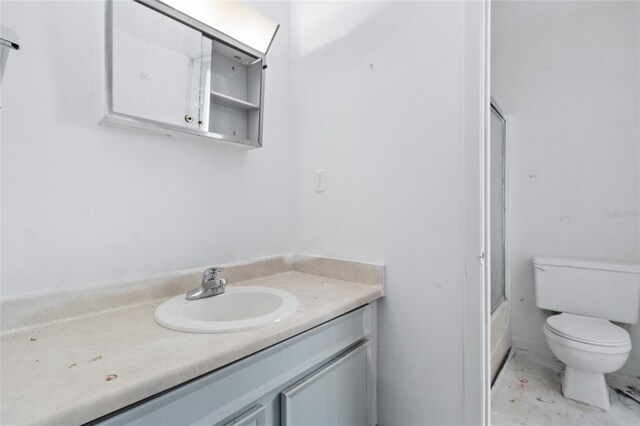 1515 Paul Russell Rd # 64, Tallahassee, FL 32301 - full bath featuring vanity, toilet, and combined bath / shower with glass door