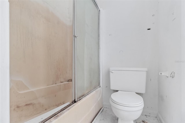 1515 Paul Russell Rd # 64, Tallahassee, FL 32301 - full bath featuring baseboards, toilet, and bath / shower combo with glass door