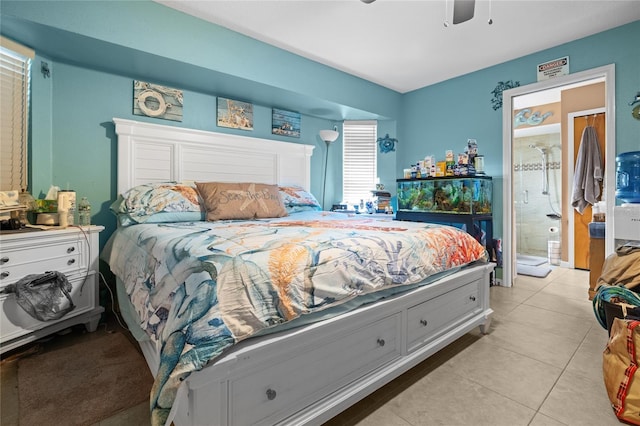 10229 Gulfstream Blvd, Englewood, FL 34224 - bedroom with light tile patterned flooring and a ceiling fan